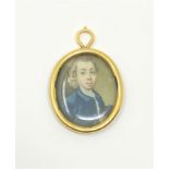 An early 18th century portrait miniature in high carat gold frame