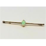 A 15ct gold opal bar brooch