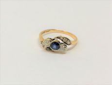 An antique 18ct gold sapphire and diamond ring, 2g.