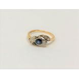 An antique 18ct gold sapphire and diamond ring, 2g.