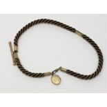 An antique hair Albert chain with gold T-bar, dog-catch and fittings.