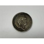 An 1831 5 Francs coin