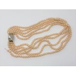 A good quality 15 inch five strand pearl necklace on two tone 14ct gold catch