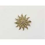 A 15ct gold pearl star brooch, 4.85g.