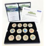 Westminster Coins - The Age of the Dinosaurs, twelve coins with certificates, 24ct gold plated.