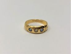 An antique 18ct gold sapphire and diamond ring, 2.85g. CONDITION REPORT: Ring size M.