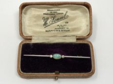 A yellow gold and platinum set opal and diamond brooch, 3.25g.