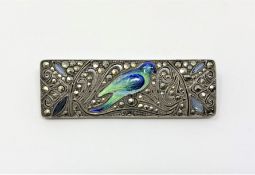 A good quality enamelled silver and marcasite brooch depicting a parakeet
