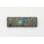 A good quality enamelled silver and marcasite brooch depicting a parakeet