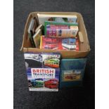 A box of books and DVD box sets relating to transport.