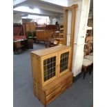 A blonde oak modular unit fitted with cupboards and drawers