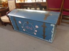An antique oak painted metal bound shipping trunk