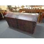 An antique metal bound shipping trunk (locked - no key)