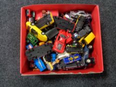 A box of play worn die cast vehicles