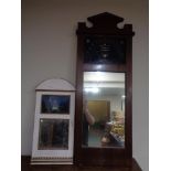 An antique mahogany hall mirror and one further mirror