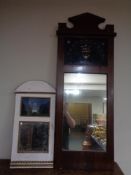 An antique mahogany hall mirror and one further mirror