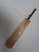 A miniature Crusader M. C. C. Australian team 1954/5 cricket bat.