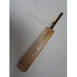 A miniature Crusader M. C. C. Australian team 1954/5 cricket bat.