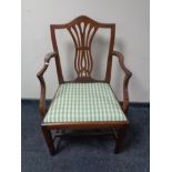 An antique mahogany Hepplewhite style dining chair