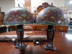 A pair of Tiffany style table lamps with leaded glass shades