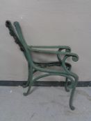 A pair of cast iron bench ends