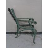 A pair of cast iron bench ends