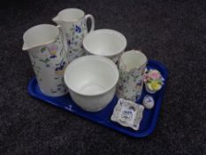 A tray of three Coalport pageant graduated jugs, two planters,