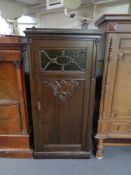 A 20th century oak cabinet