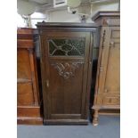 A 20th century oak cabinet