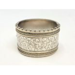 A fine late Victorian silver cuff bangle with engraved decoration CONDITION REPORT: