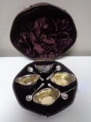 A set of four silver salts with spoons, London 1887, Walter & John Barnard.
