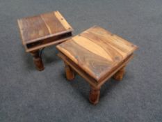 A pair of sheesham wood lamp tables