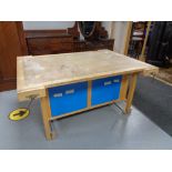An Lervad school wood working bench fitted with internal drawers and four vices