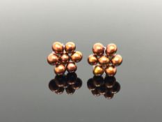 A pair of freshwater pearl and gold earrings