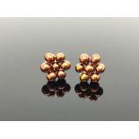 A pair of freshwater pearl and gold earrings