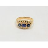 An 18ct gold sapphire and diamond ring, size Q CONDITION REPORT: 2.