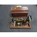 A vintage Jones Medimcs sewing machine in case