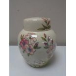 A Moorcroft spring blossom lidded ginger jar, height 16.5 cm.