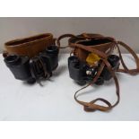 A pair of Carl Zeiss Jena 6 x 24 binoculars in leather case and one other pair.