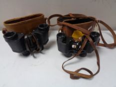 A pair of Carl Zeiss Jena 6 x 24 binoculars in leather case and one other pair.