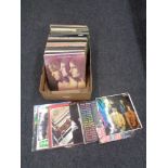 A box of vinyl LP records - Eric Clapton, Queen, The Beatles, 10 CC,