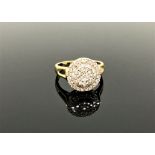 An 18ct gold diamond cluster ring,