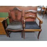 An antique mahogany armchair and a shield back armchair