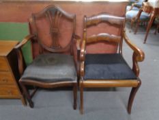 An antique mahogany armchair and a shield back armchair