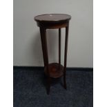 A Victorian inlaid mahogany two tier plant stand