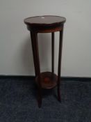 A Victorian inlaid mahogany two tier plant stand