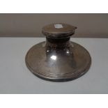 A silver inkwell
