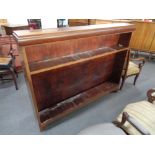 A set of mahogany open shelves