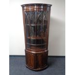 A mahogany Regency style corner display cabinet