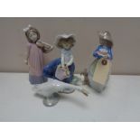 Three Nao figures, girl with basket,